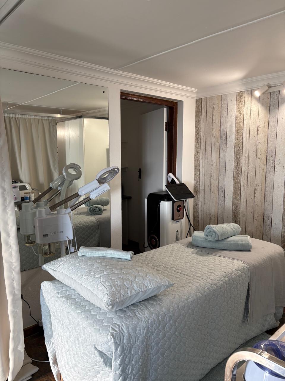 Younger Sensation treatment room with a prepared treatment bed
